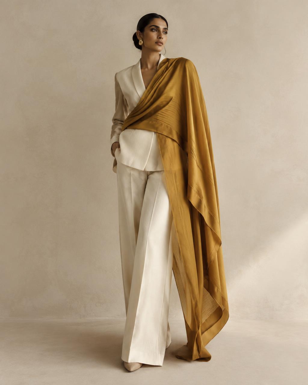 Ivory co-ord with an ochre silk drape